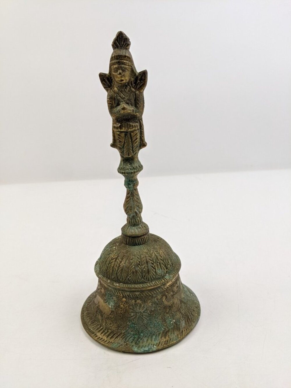 Vintage Indian brass temple bell Hindu Hanuman temple hand bell 2 faced deity 7"